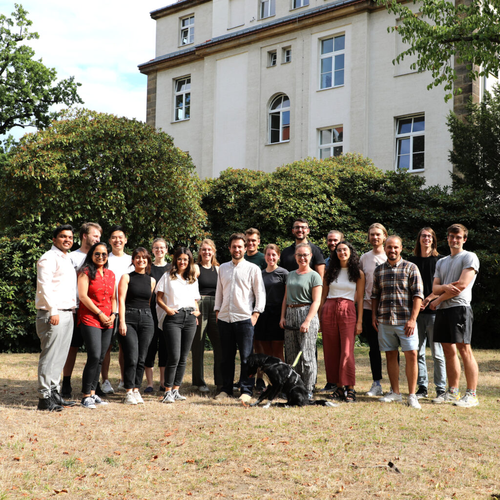 group picture research group for clinical AI in front of EKFZ building