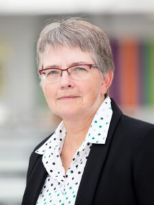 Portrait Heike Grabsch woman with glasses, short hair